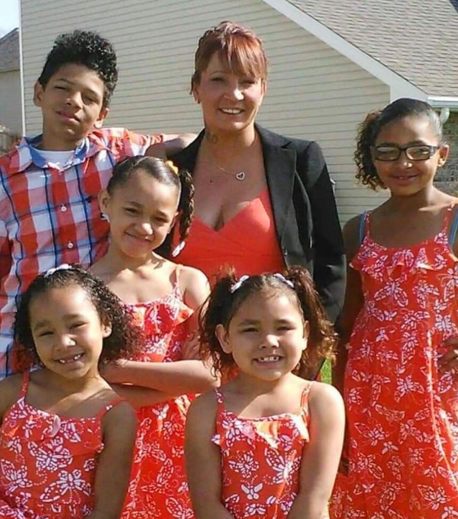 Tara Knedler, center, and her five children